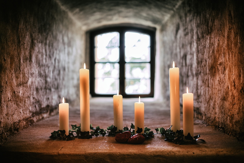 lighted, concrete, gray, white, fire - natural phenomenon, taper, room, day, illuminated, place of worship, candle, architecture, six, burning, nature