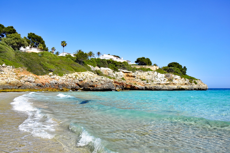 bay, solid, tranquility, balearic islands, clear sky, spain, rock - object, 4K, tranquil scene, scenics - nature, outdoors, vacations, nature, sand, sun