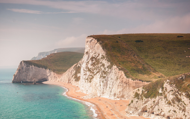 tranquil scene, idyllic, landscape, cliffside, non-urban scene, seascape, nature, durdledoor, rock - object, scenics - nature, cliffs, water, outdoors