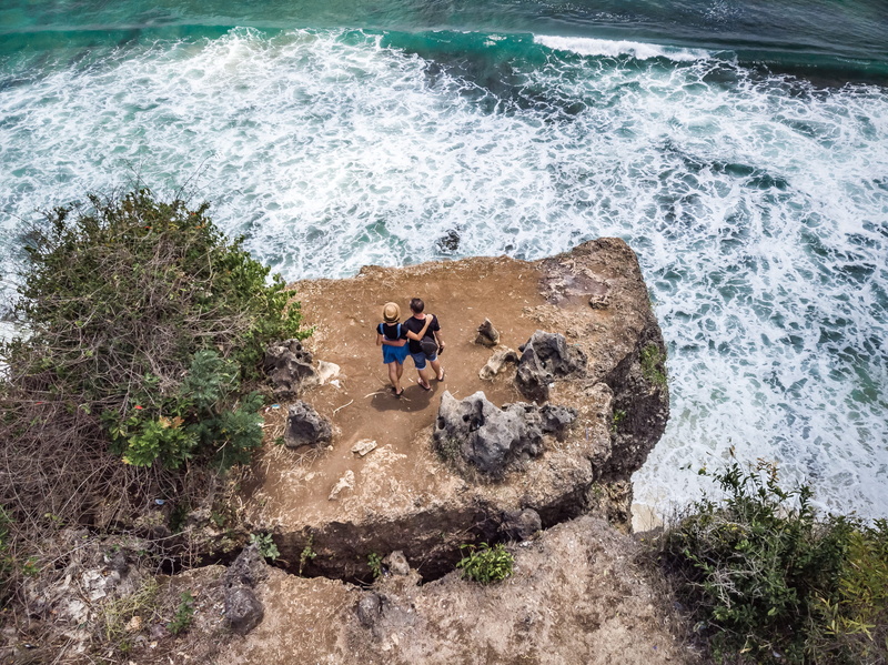real people, adventure, motion, high angle view, summer, two people, view, beach, water, affection, shore, lifestyles, nature, waves, rock - object, together