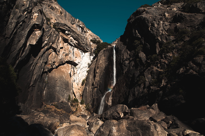 formation, waterfalls, mountain, rough, no people, low, non-urban scene, angle, nature, rainbow, tranquil scene, looking up, explore, blue, travel, cliff