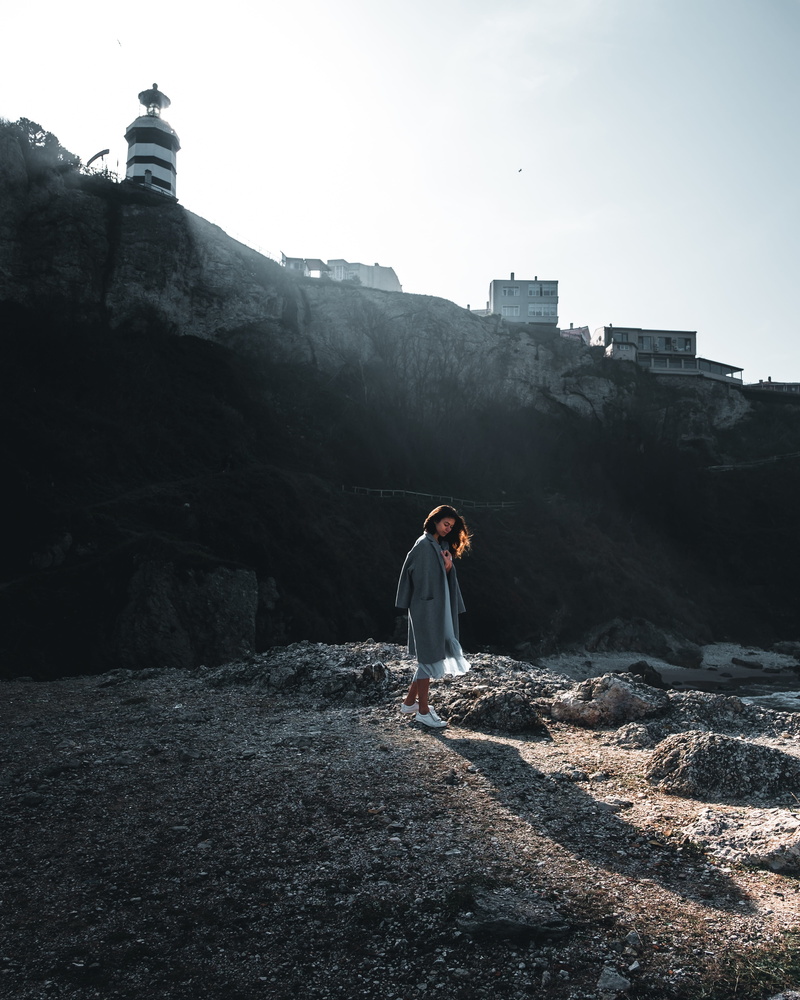 contract, cliff, young adult, day, casual clothing, brunette, nature, walking, woman, human, people, portrait, coat, shadow, history, holding, clear sky