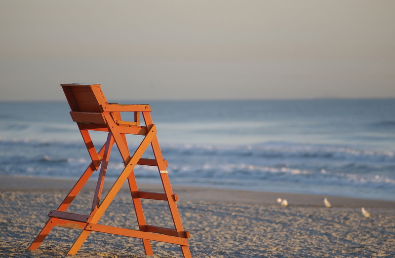 sea, horizon over water, outdoors, vacations, wooden, chair, sky, coastline, sunset, sand, horizon, brown, lifeguard hut, beauty in nature, tranquility