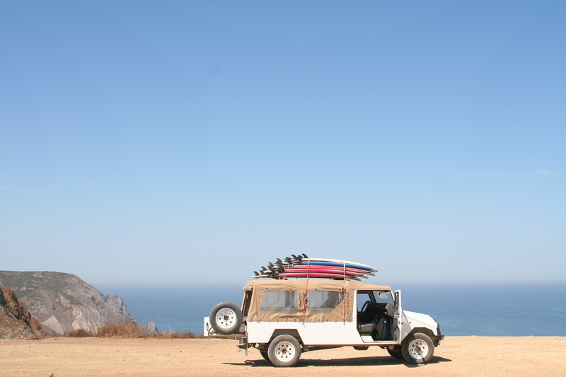 suv, sunny, mode of transportation, surfboard, transportation, near, clear sky, blue, car, desert, sports Utility Vehicle, day, scenics - nature, portugal
