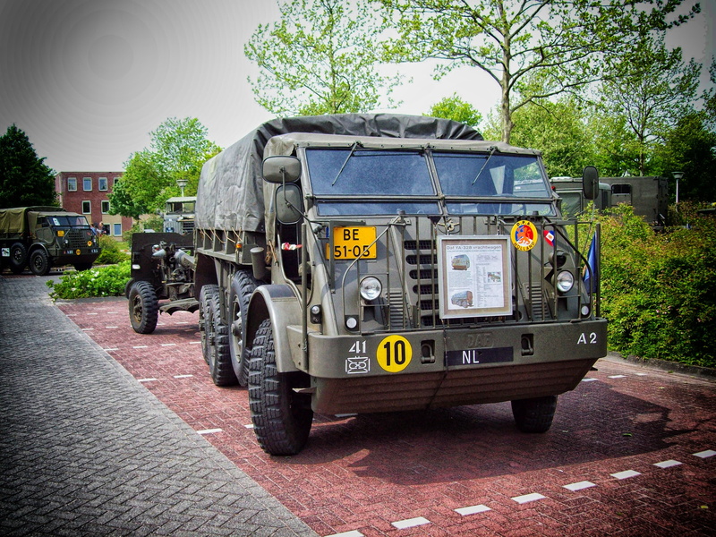 plant, outdoors, army, city, creativity, no people, nature, road, built structure, land vehicle, truck, building, wheel, 2K, accidents and disasters, barracks
