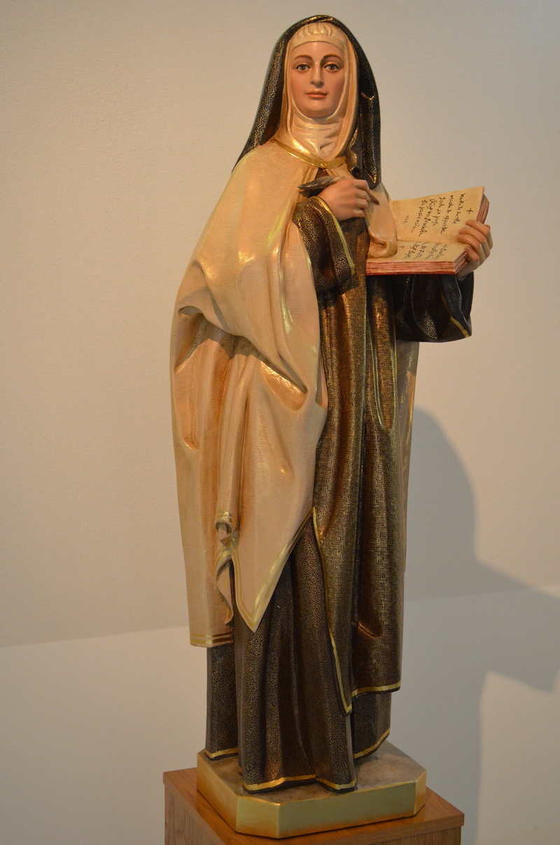 female likeness, young adult, three quarter length, santa, fashion, standing, nun, avila, statue, people, front view, religion, beautiful woman, representation