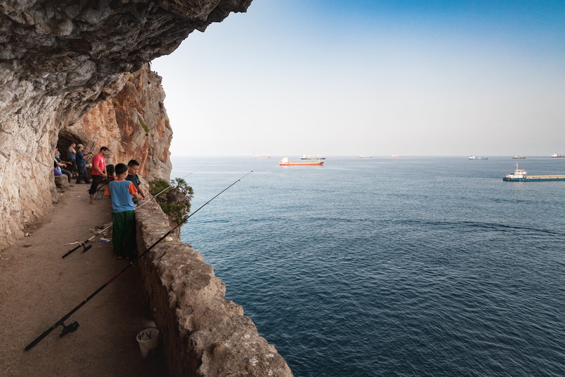 Bejaia, men, sea, full length, Mediterranean, one person, rock - object, coast, Algeria, rock, land, algerie, outdoors, leisure activity, solid, horizon over water