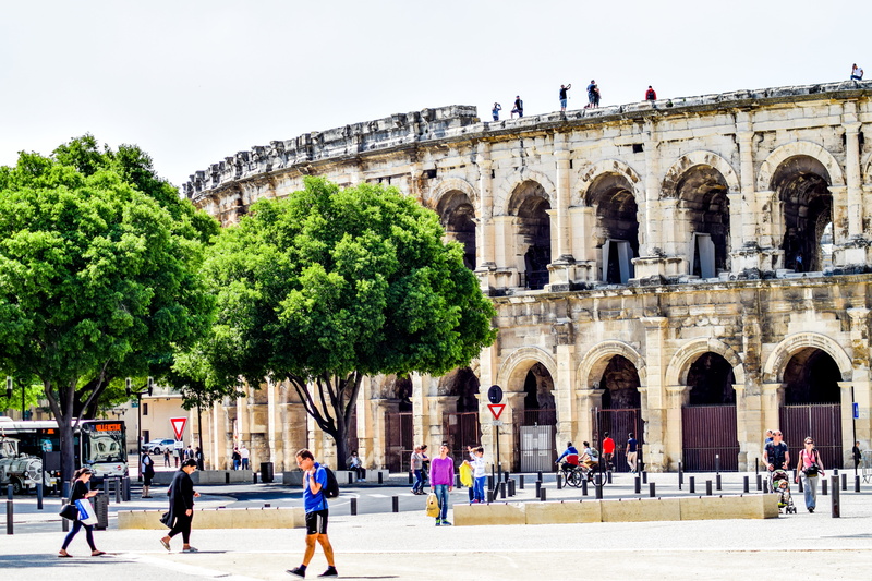 bulls, building exterior, Arenas, travel destinations, crowd, visit, incidental people, Nimes, roman city, City, amphitheater, day, history, nature, women