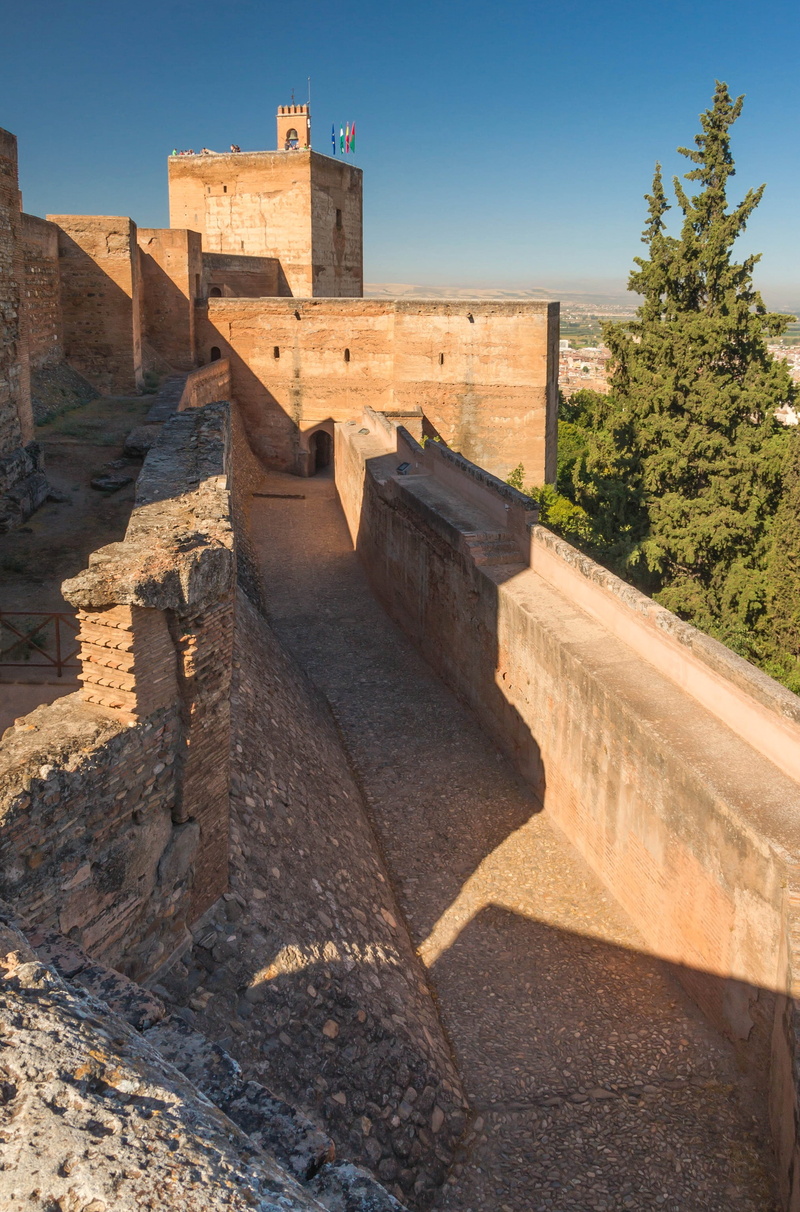 grenada, destinations, fortress, building exterior, clear sky, no people, shadow, stone, sky, ancient civilization, architecture, travel destinations, trees