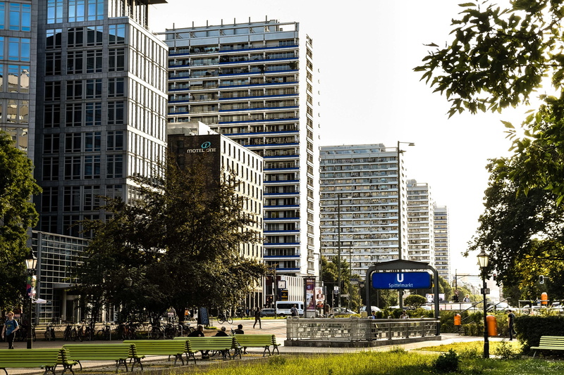 glass facade, facade, incidental people, building, street, ddr, sky, outdoors, tall - high, day, places of interest, structures, building exterior, capital