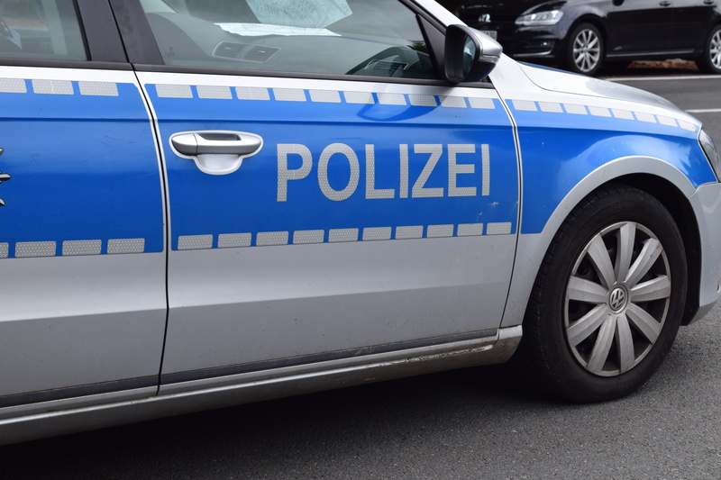security, white color, police car, police officers, safety, no people, city, government, police, car, patrol, text, law, police force, protection, blue
