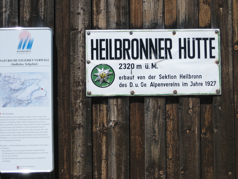 capital letter, outdoors, representation, close-up, wall - building feature, no people, marijuana - herbal cannabis, 2K, guidance, Hut, Alpine Club, sign