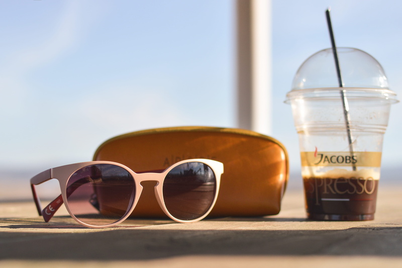 4K, surface level, outdoors, eyewear, glasses, drink, close-up, fashion, clear, disposable, no people, nature, jacobs, solo, black, espresso, safety, blue