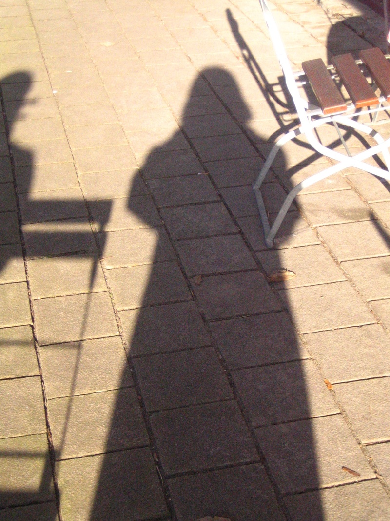 light, darth vader, people, real people, human, outdoors, shadow, personal, sunlight, shadow play, footpath, street, paving stone, fashion, dark side of power
