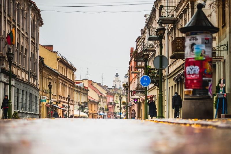 street, surface level, city Life, incidental people, outdoors, concrete, city, tourist, alley, building, urban Scene, residential district, facade, road