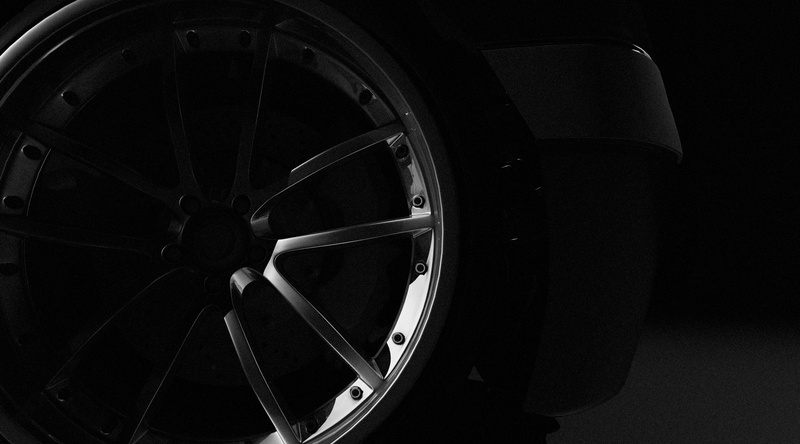 single object, land vehicle, studio shot, indoors, Aero, retro styled, wheel, close-up, dark, Black, rims, chrome, felgen, transportation, metal, black background
