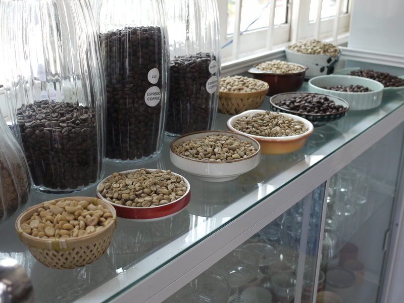 indoors, day, cafe, table, wellbeing, container, cappuccino, retail, retail display, still life, glass - material, freshness, coffeebean, variation, no people