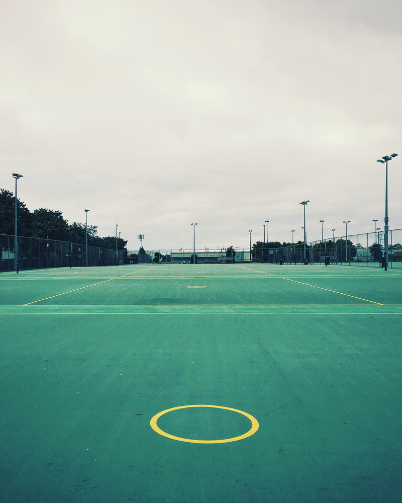 playing field, tennis, no people, grass, green color, sky, circle, auckland, cloud - sky, absence, nature, architecture, shape, soccer, field, court, day