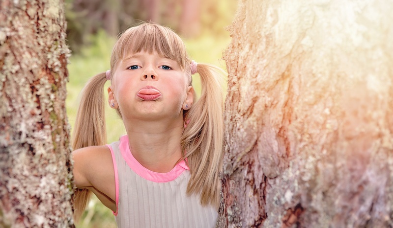 forest, childhood, body part, face, cheerful, show tongue, nature, plant, day, child, girl, human, hairstyle, innocence, summer, lighting, females, out