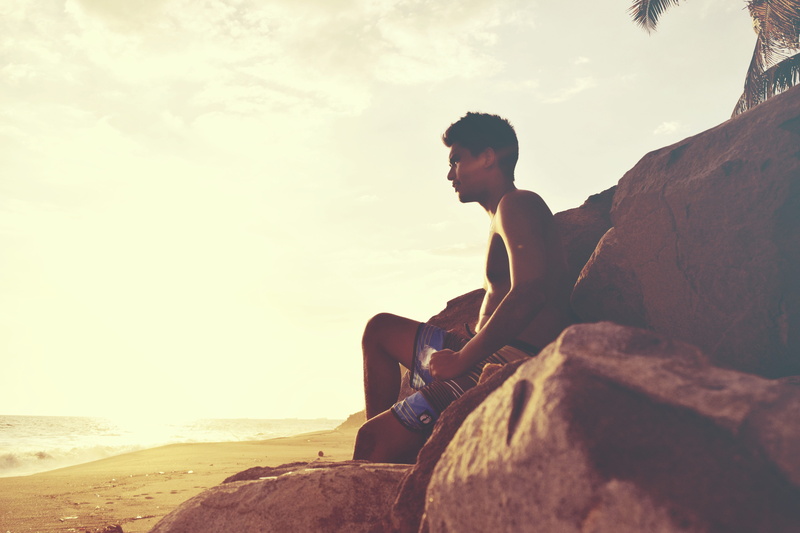 adult, copy Space, caucasian Ethnicity, coast, rock, leisure activity, real people, rock - object, beauty in nature, looking, water, relaxation, on the beach