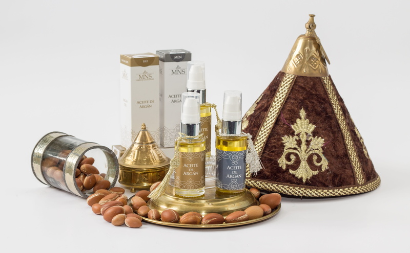 gold, finance, close-up, bottles, large group of objects, argan, variation, perfumery, traditional, indoors, no people, oil, bottle, coin, white background