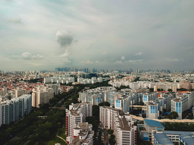 city life, outdoors, building exterior, day, architecture, town, skyscraper, formation, no people, built structure, sky, flats, clouds, cloud - sky, high angle view