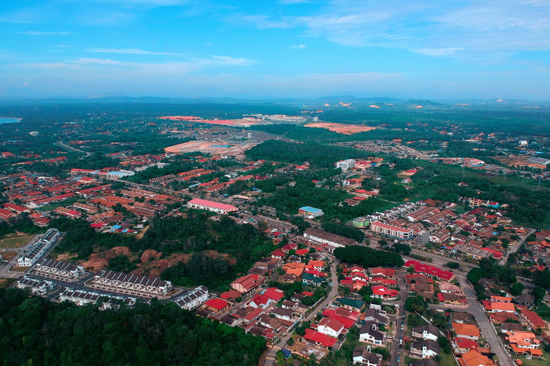 high, residential district, urban, outdoors, environment, town, beauty in nature, building, aerial shot, building exterior, bird, cloud - sky, plant, horizon