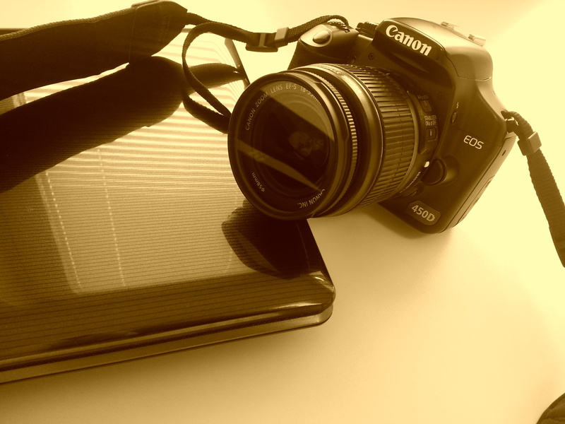 one person, Canon EOS 450D, slr camera, digital camera, lens - optical instrument, finger, retro styled, close-up, antique, camera, photographic equipment