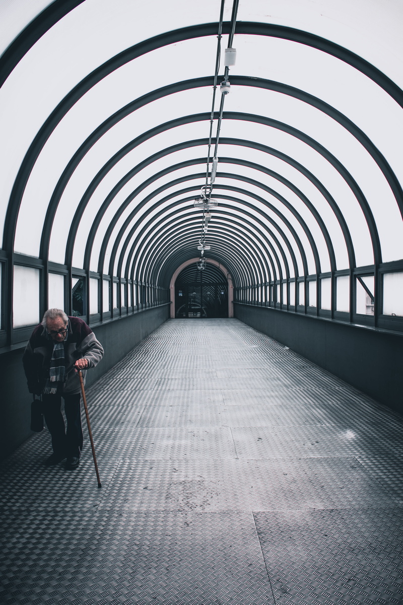 direction, rear view, leisure activity, urban, pattern, arch, transportation, walking, building, city, handrail, path, lifestyles, tunnel, using, sidewalk