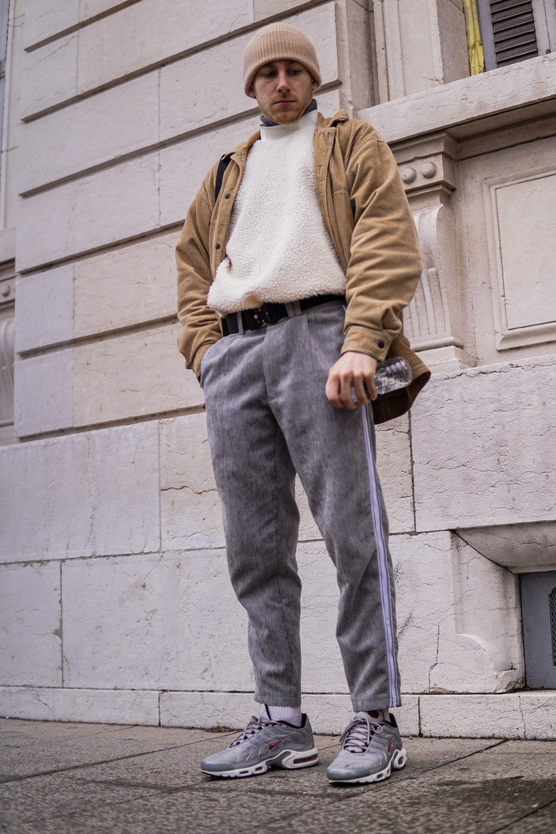 human, fashion, looking at camera, men, jeans, front view, coat, undershirt, footwear, apparel, wood, sleeve, hat, lifestyles, jacket, clothing, wearing