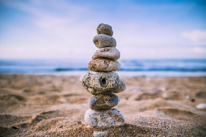tranquility, outdoors, sky, pile, horizon, tranquil scene, nature, scenics, sea, amazing, solid, sand beach, water, no people, gray, pebble, beach, overview