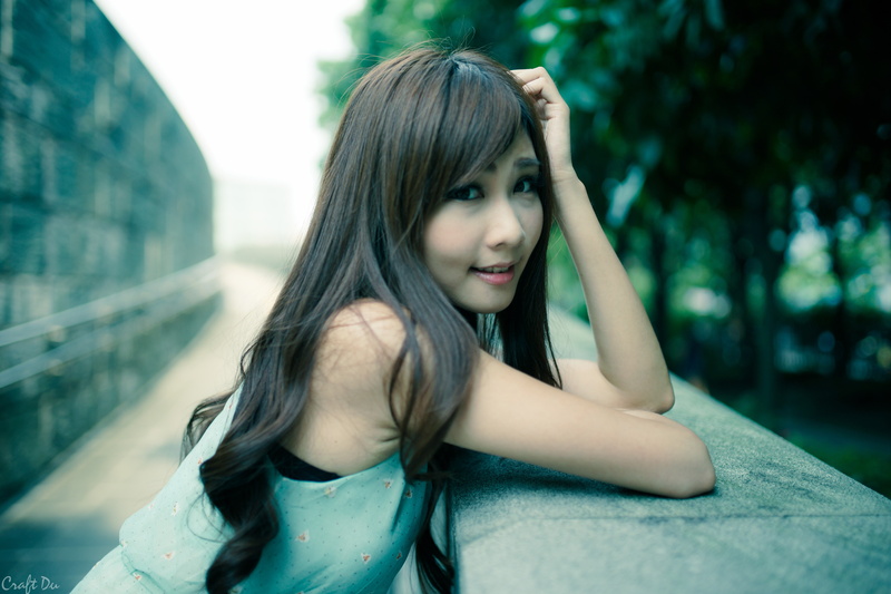 hairstyle, beautiful woman, focus on foreground, architecture, long hair, beauty, adult, young adult, contemplation, outdoors, Zhang Ya Zhu, one person
