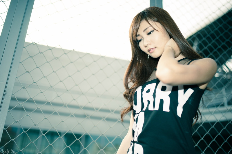 women, leisure activity, casual clothing, long hair, fence, front view, standing, black, young women, Zhang Ya Zhu, young adult, outdoors, one person, hairstyle