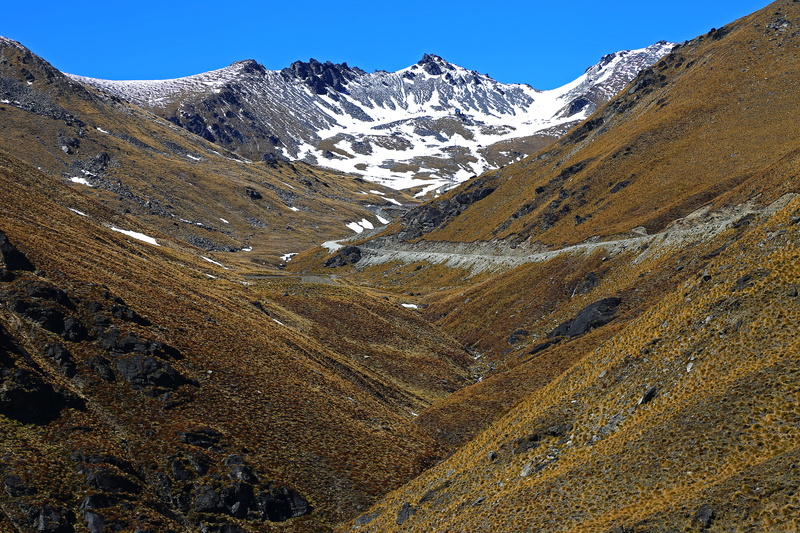 tranquil scene, view, travel destinations, landscape, the road to the skifield, tussock, wilderness, countryside, range, valley, snowcapped mountain, slope