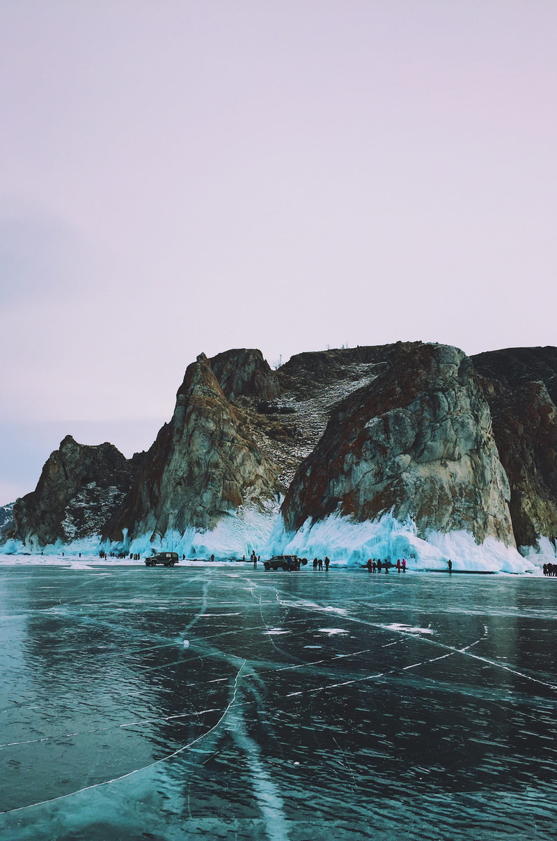 mountain range, promontory, ocean, person, no people, landscape, tranquility, shoreline, nature, beauty in nature, cliff, clear sky, tranquil scene, sky
