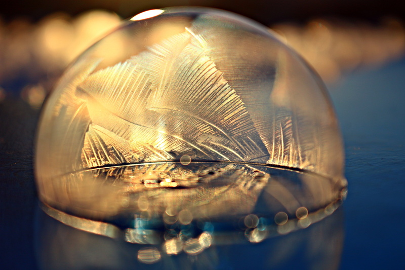 frost blister, no people, day, soap bubble, selective focus, water, frozen, bubble, glass - material, gear, shape, design, nature, blue, indoors, frozen bubble