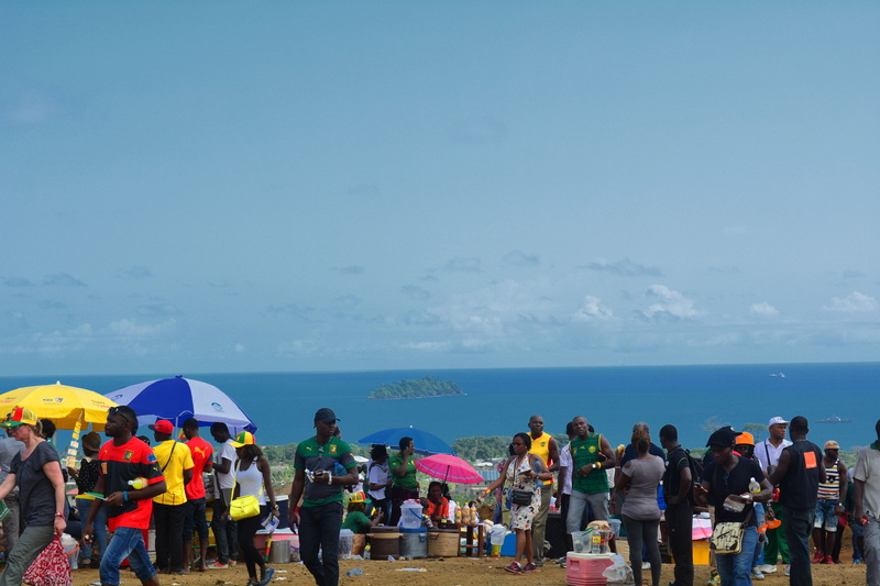 land, horizon over water, football, atlantic ocean, kmertour, outdoors, cameroon, women, beauty in nature, sea, umbrella, limbe, day, crowd, men, fako