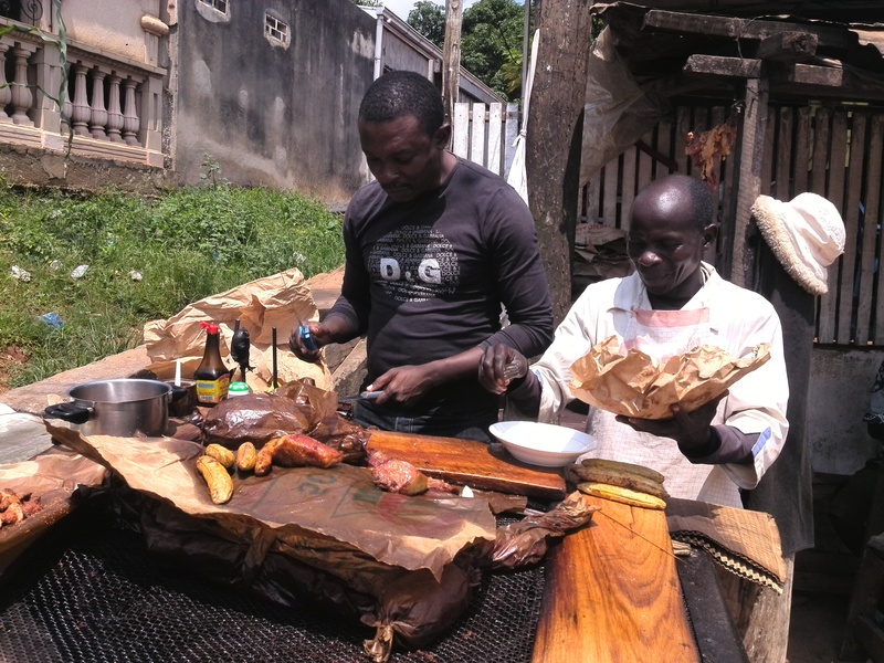 kitchen, preparing food, lifestyles, day, standing, preparation, 2K, good, food, front view, occupation, young men, real people, meat, cameroon, working
