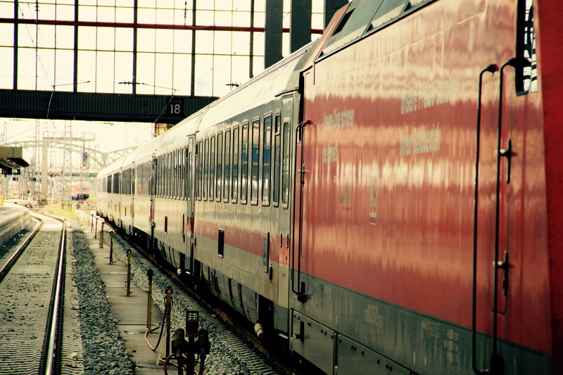 railroad track, public transportation, outdoors, train - vehicle, deutsche bahn, passenger train, leaving, mode of transportation, train, railroad station