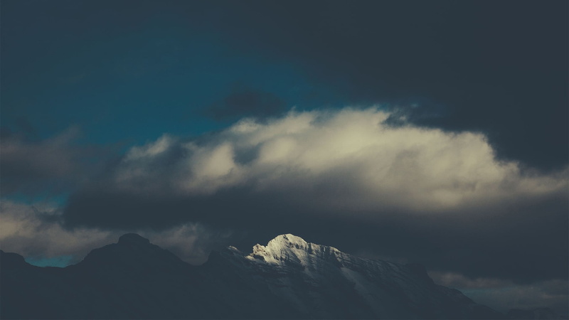no people, tranquil scene, clouds, snowy peak, nature, sky, snowcapped mountain, mountain, outdoors, mountains, mountain range, rock, environment, winter