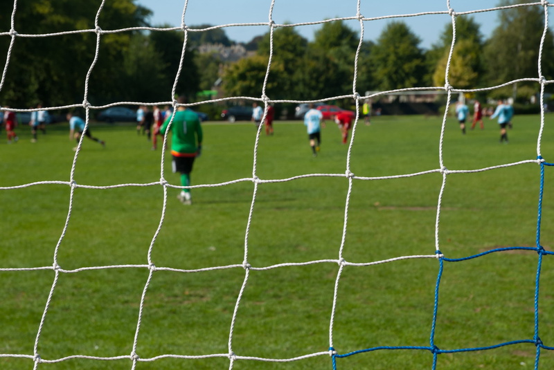 plant, outdoors, soccer player, playing field, competitive sport, grass, net - sports equipment, soccer field, goalkeeper, people, soccer, football, playing