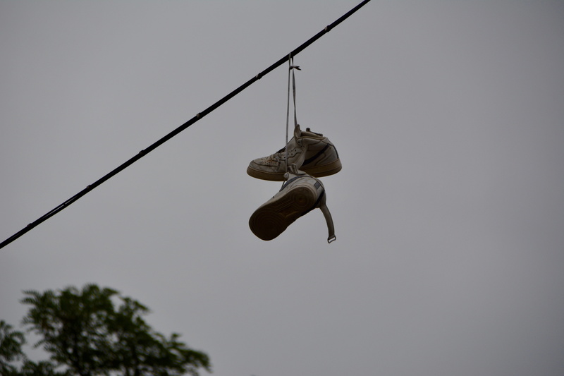 one person, 5K, full length, leisure activity, unrecognizable person, street art, nature, urban, lifestyle, hanging, outdoors, modern, shoes, fashion