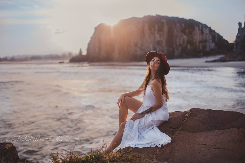 sky, leisure activity, women, land, scenics - nature, lifestyles, fashion, hair, hairstyle, women with hats, nature, women outdoors, water, tattoo, hat