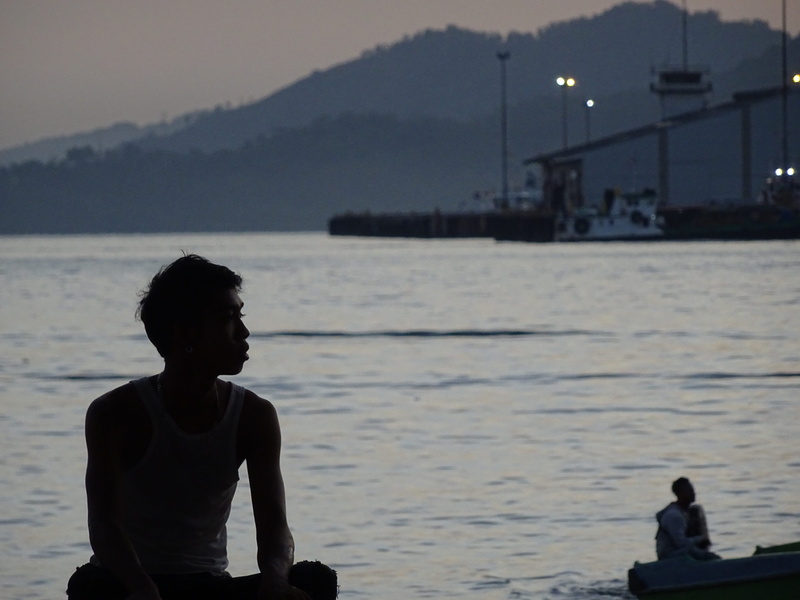 outdoors, dark, borneo, waist up, looking at view, water, three quarter length, scenics - nature, rear view, leisure activity, dawn, kota kinabalu, silhouette