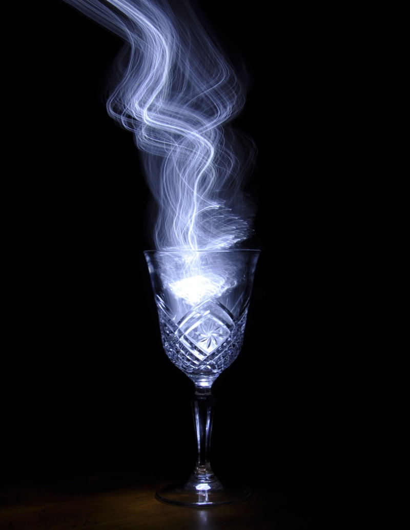 copy space, smoke - physical structure, lighting equipment, magic, glass, light bulb, fuel and power generation, single object, smoke, transparent, glass - material
