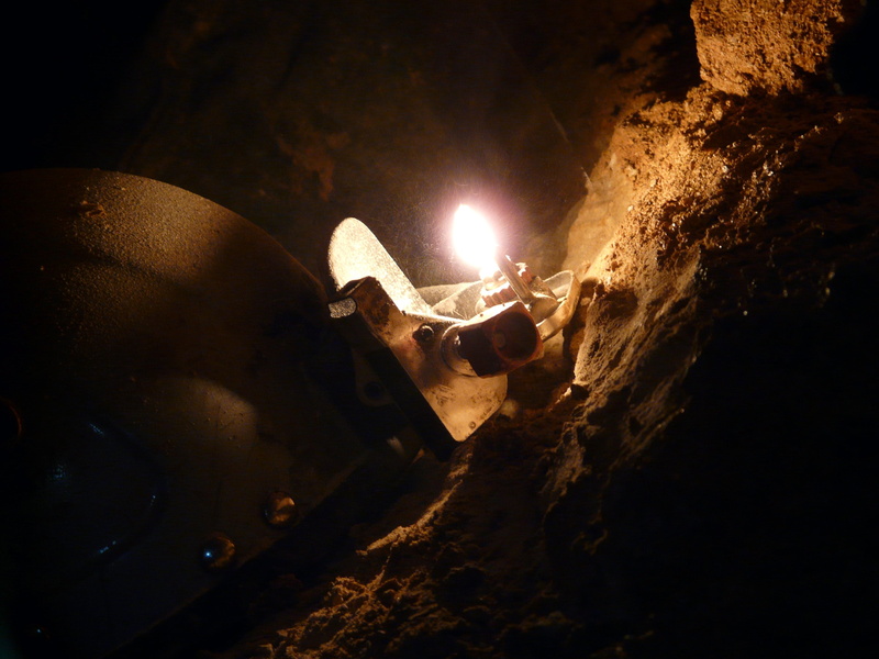 adventure, illuminated, speleology, outdoors, one person, light - natural phenomenon, solid, lamp, rock, rock - object, carbide, human arm, human limb