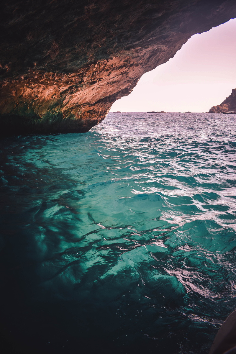 ocean, blue, no people, tranquility, rock formation, eroded, idyllic, clear water, land, sky, rock, nature, waterfront, sea, italy, beauty in nature, outdoors