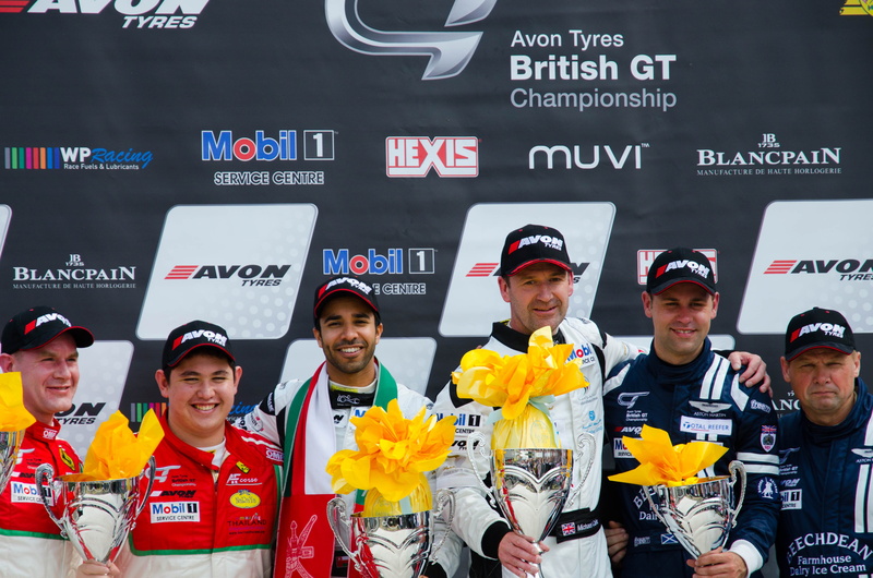 sport, championship, race car, looking at camera, smiling, people, women, child, season, happiness, flowering plant, flower, emotion, adult, group of people