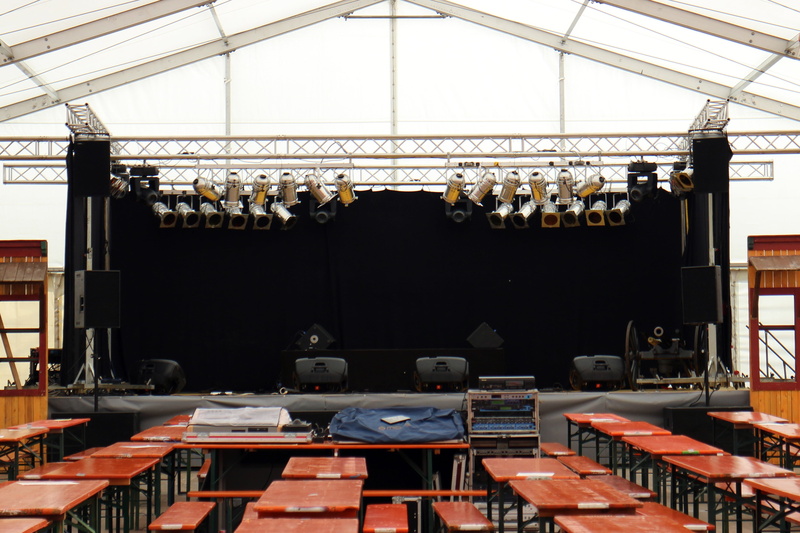 tables, podium, business, lighting equipment, furniture, electric lamp, table, tent, illuminated, absence, stage - performance space, no people, architecture