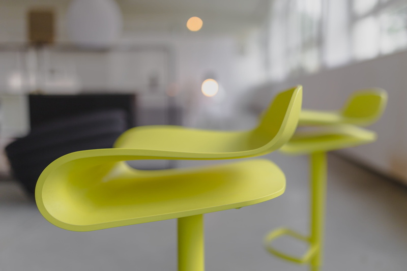 furniture, focus on foreground, business, bar chair, designer, bar, modern, close-up, no people, tall, seat, office, single object, plastic, stool, absence